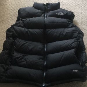 Men's north face puffy vest.